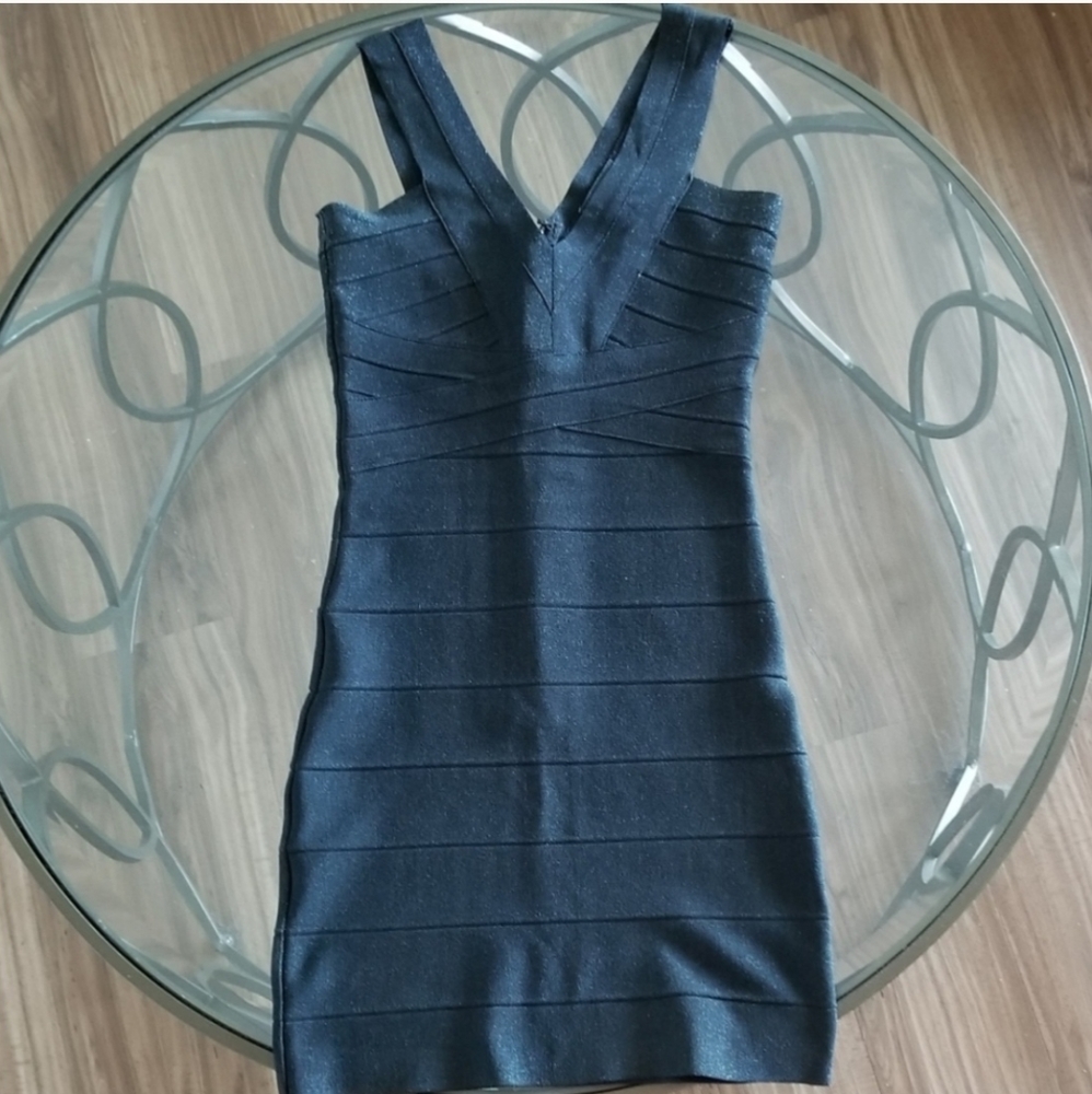 ** SOLD ** BEBE Black shimmery bandage dress size XS
